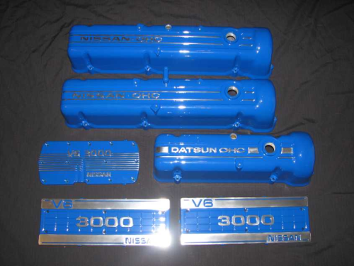 Misc Nissan and Datsun parts in mirror blue with polished lettering and clear powder